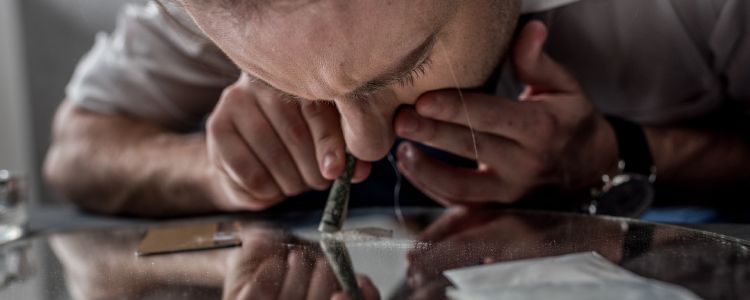 A man snorting drugs