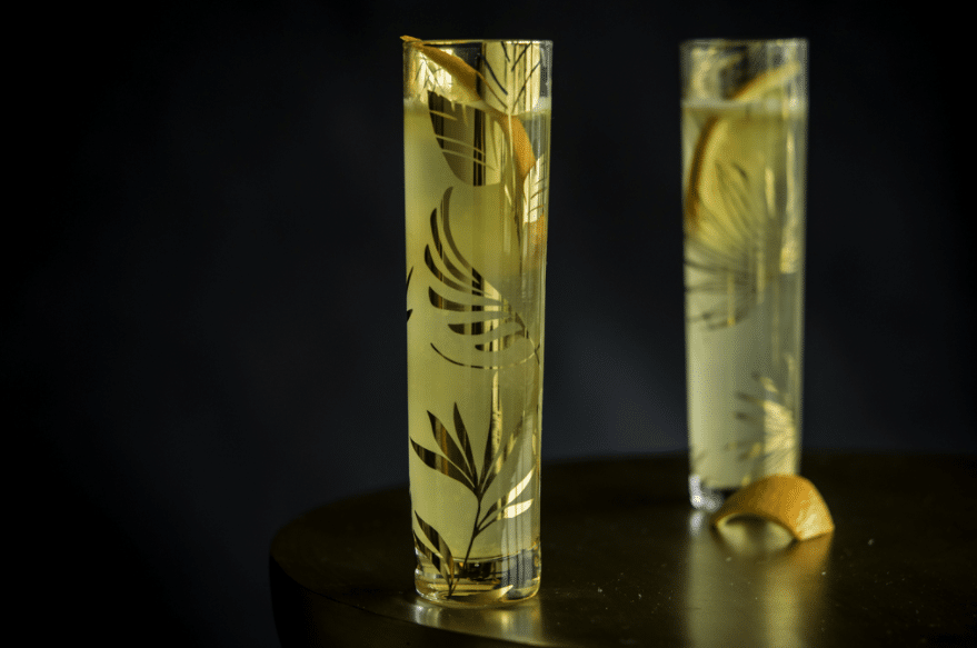 two glasses of Juniper Berry Spritz on wooden table