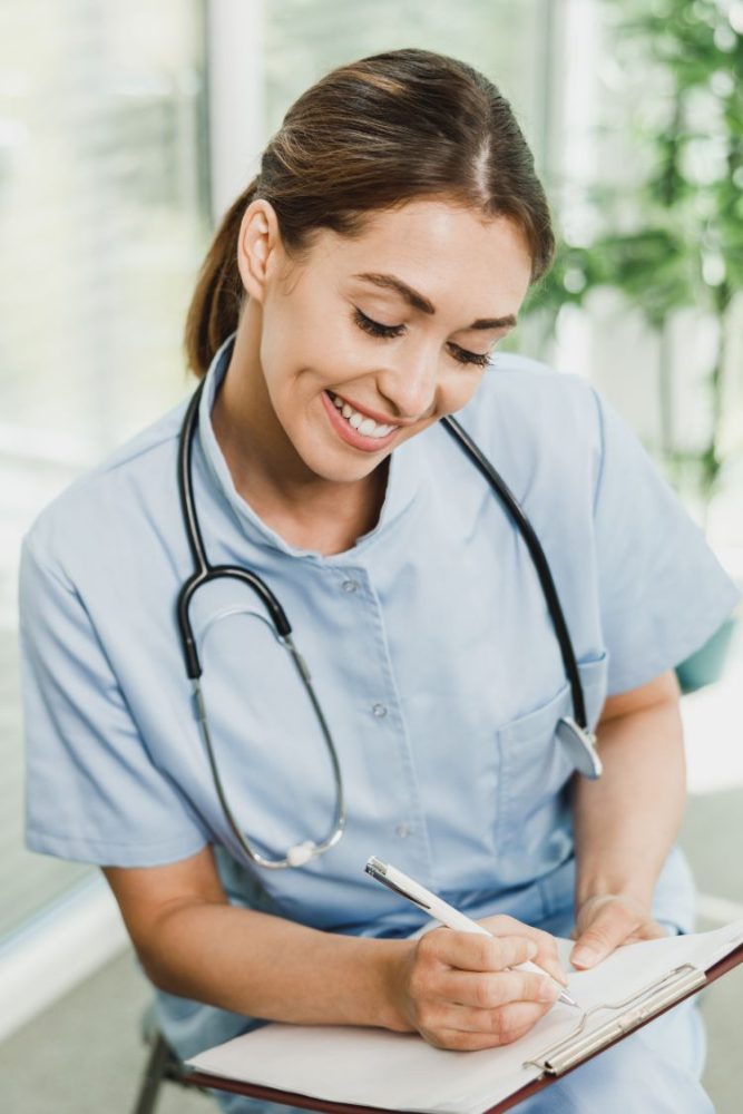 Nurse talking to man and analyzing his medical report