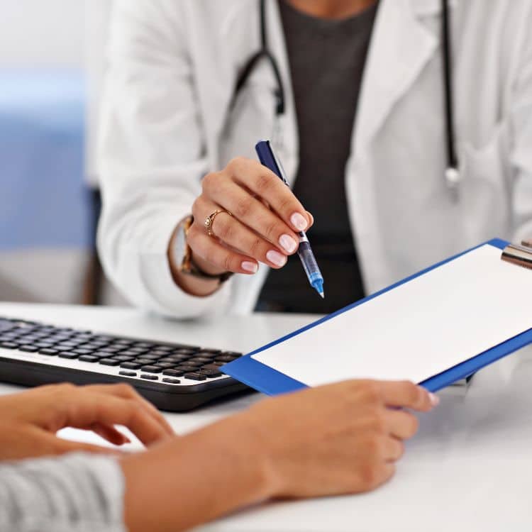 woman talking to doctor