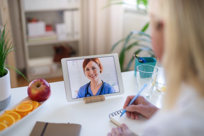 woman telehealth doctor psychiatry