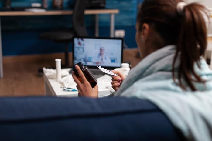 woman-at-home-on-webcam-doctor-consultation