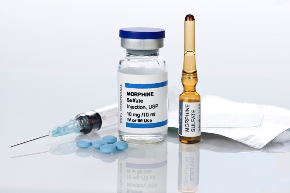 Morphine - liquid and pills, vials and needle